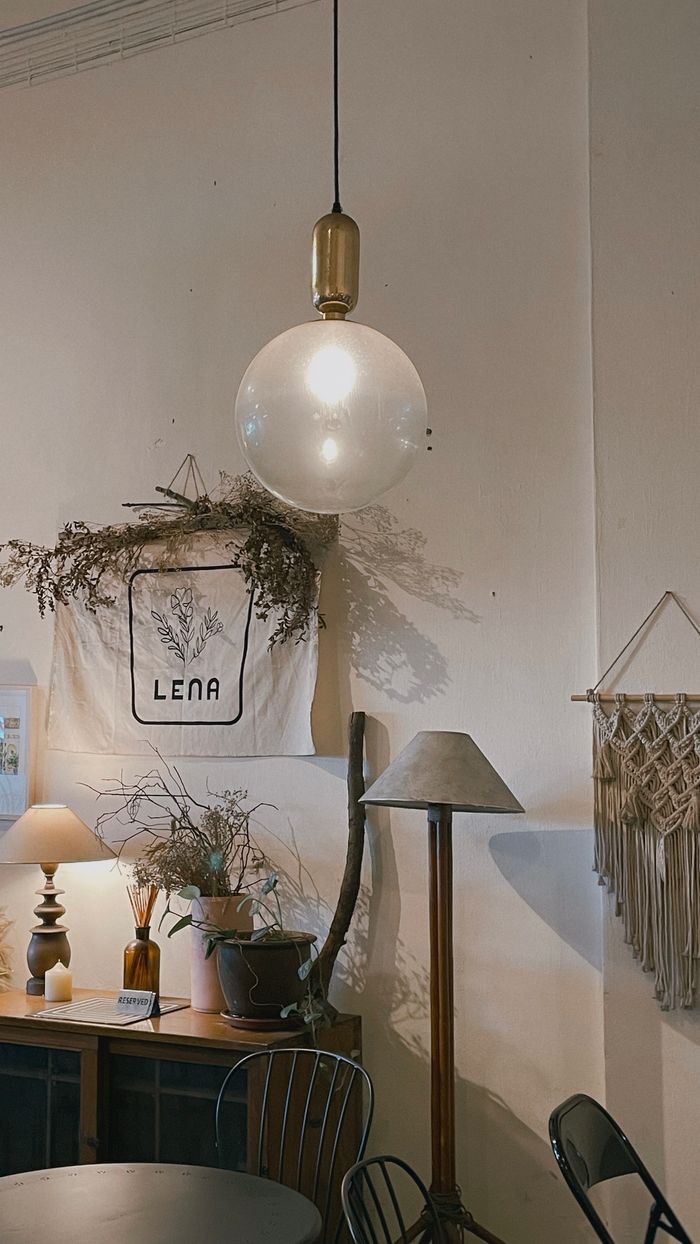 Charming rustic interior with unique lighting and decor elements, perfect for inspiration.